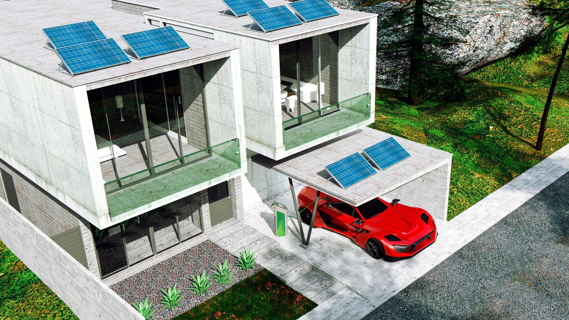 View from above of house with solar panels that are used to power the home and an electric car